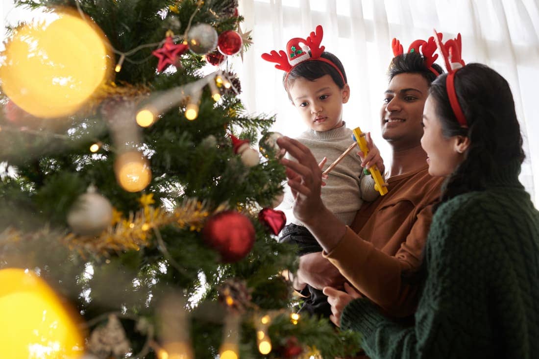 Family Decorating Christmas Tree